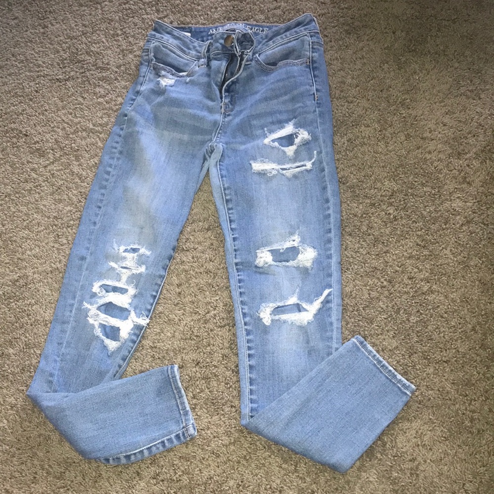 Women’s AE skinny jeans. pre-ripped with patches